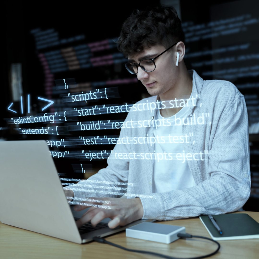 programming-background-with-person-working-with-codes-computer